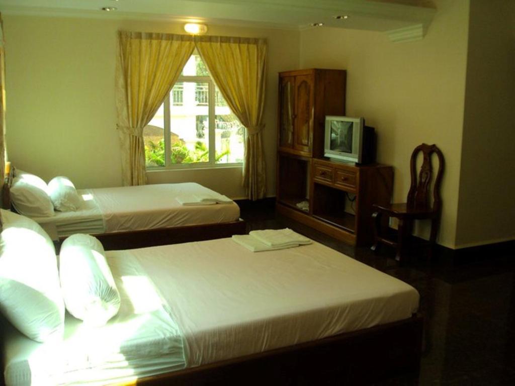 Old Town Guesthouse Kampot Pokoj fotografie