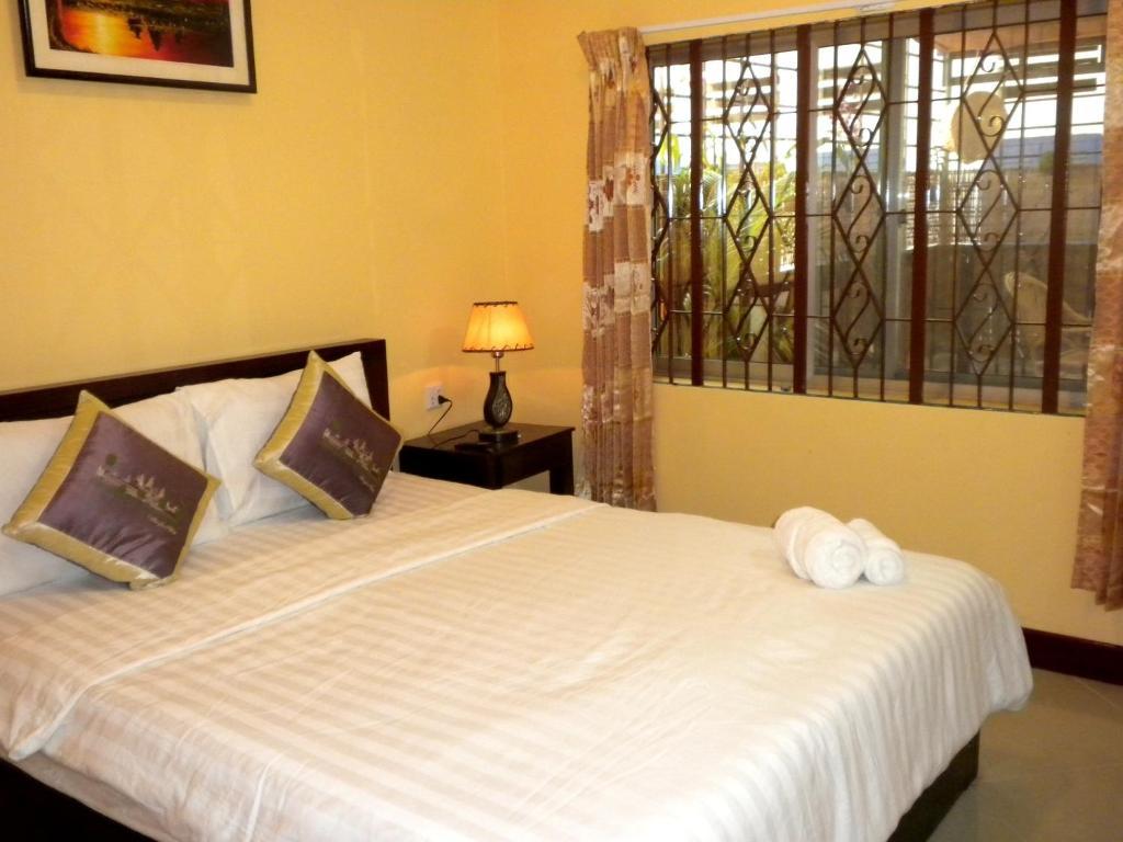 Old Town Guesthouse Kampot Pokoj fotografie